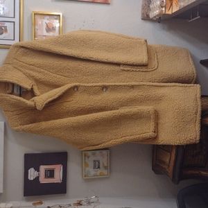 It's a women's extra large Sabrina Lauren New York light weight coat